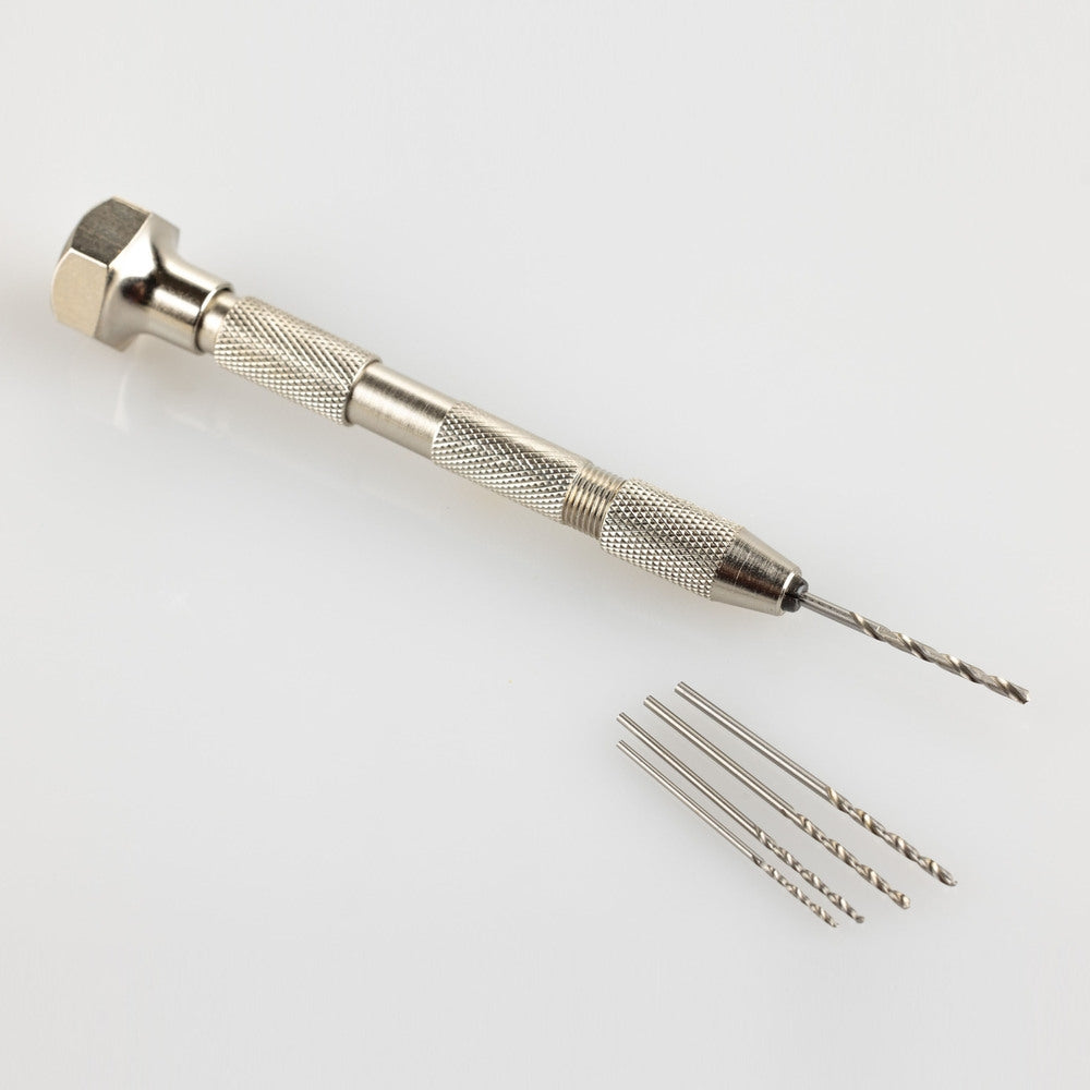 Perceuse à main Heller 99019 avec cinq forets (1, 1,2, 1,4, 1,5, 1,8 mm)