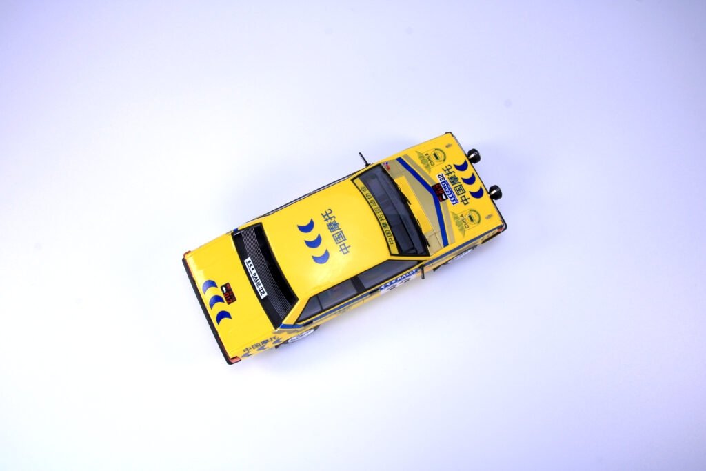 NuNu PN24032 Mitsubishi Lancer Turbo 85 Rallye Hong Kong-Pékin 1/24 – image 12